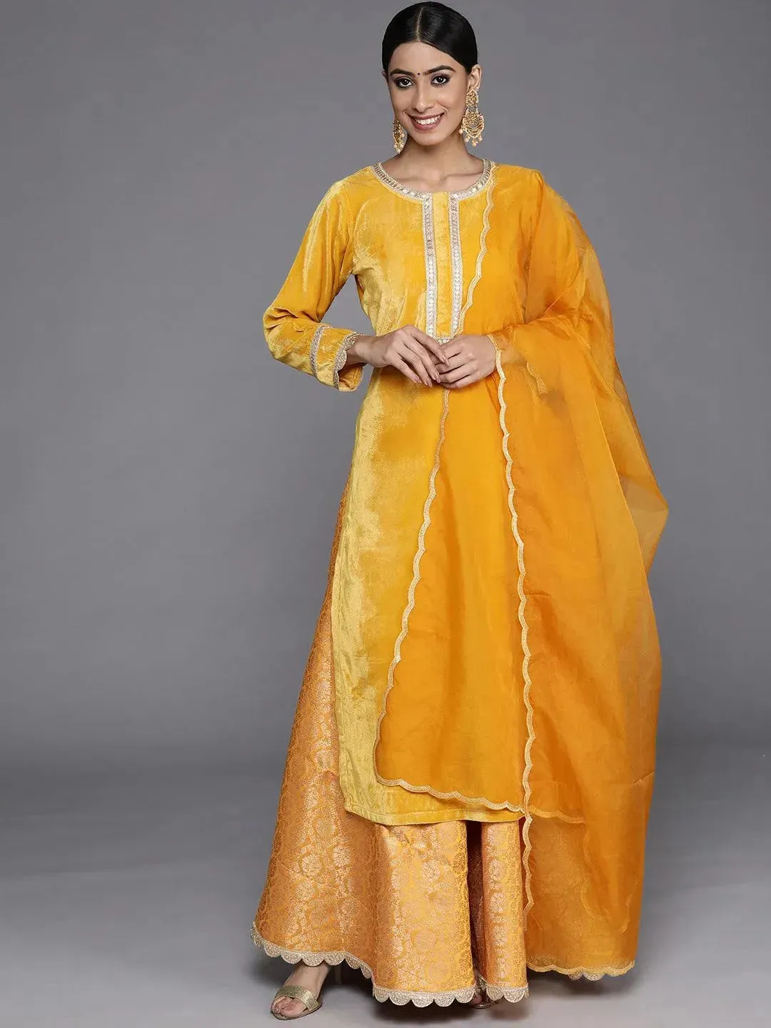 Yellow Yoke Design Velvet Straight Kurta With Skirt & Dupatta